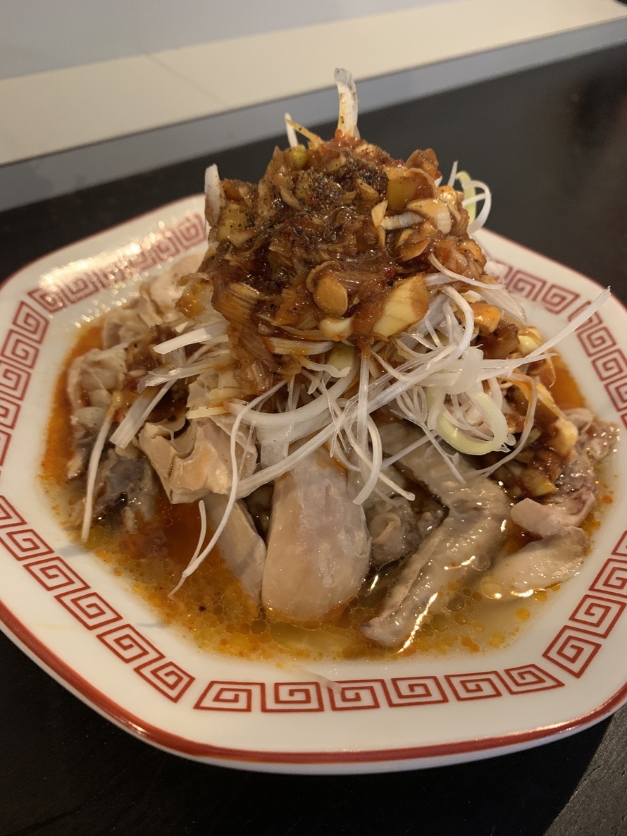 大衆ギョーザスタンドウーロン 人形町店の【復刻】丸鶏半身のヨダレ鶏